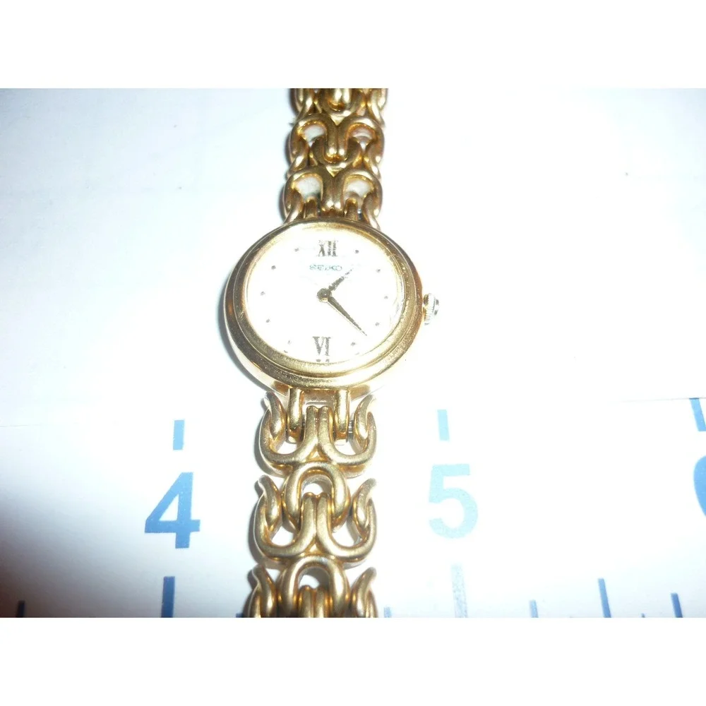 Seiko Womens Gold Tone Fancy‎ Link Bracelet Watch 1N00-1099 Roman Numeral Dial